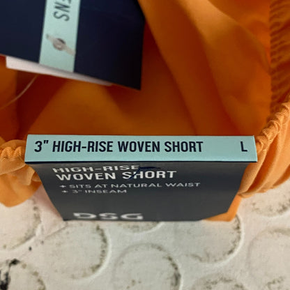 DSG Womenâs Notched Woven Shorts Light Orange Solid DAW13108