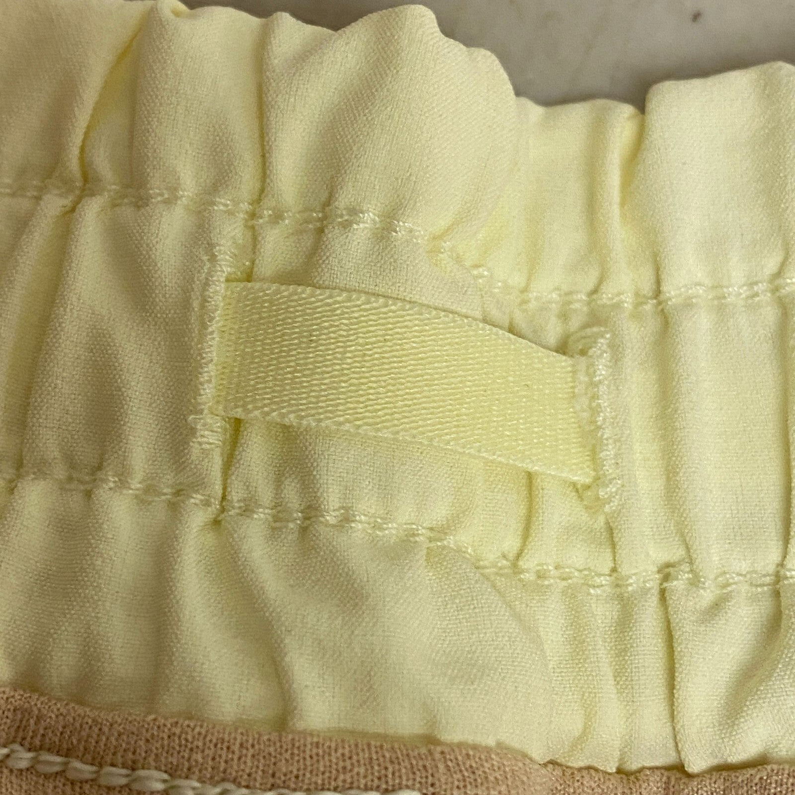 CALIA Women's Mid Rise Infinity Run Short Lemon Sorbet Solid WAX12336