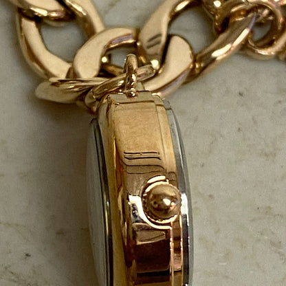 Armitron Women link bracelet with charm watch with key and lock charms 75/5067RG