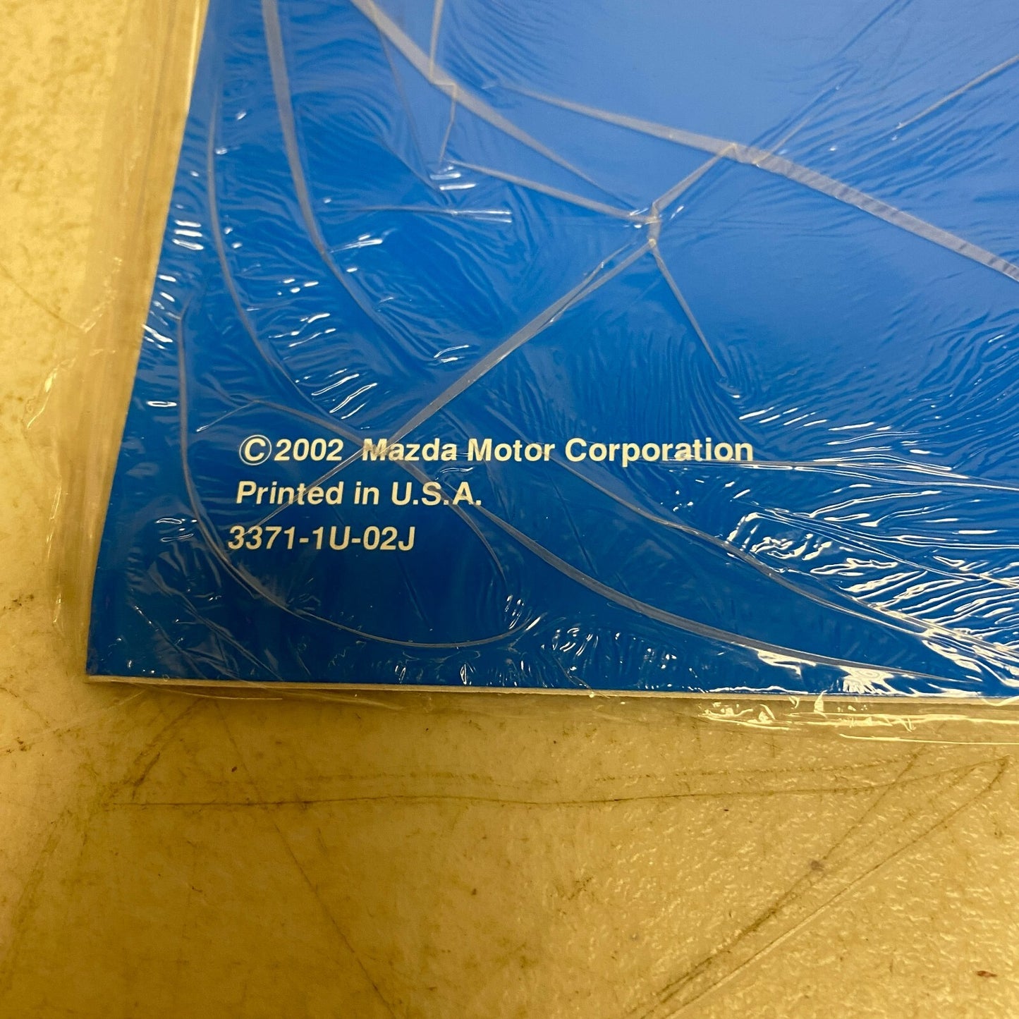 Mazda MX-5 Miata; MX-5; MPV 2003 Service Highlights 9999-95-MODL-03,#566-1CP