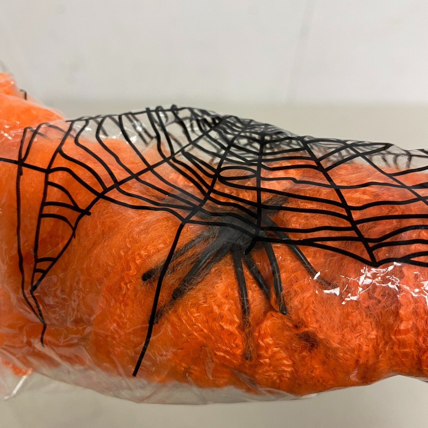 Stretchable Spider Web Decoration Orange w/ black spider Accents