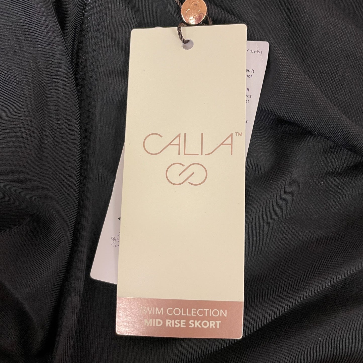 Calia Womenâs Mid Rise Wrap Swim Skort Pure Black Beach Swimwear WSA21410