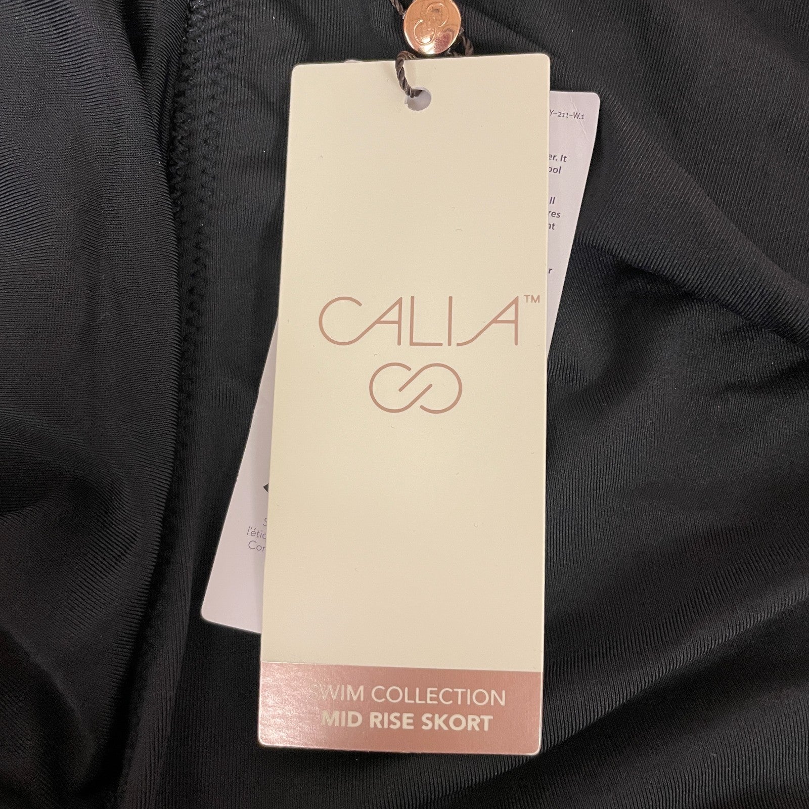 Calia Womenâs Mid Rise Wrap Swim Skort Pure Black Beach Swimwear WSA21410