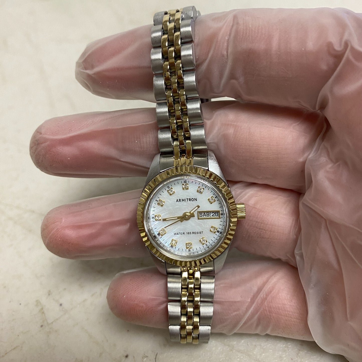 Armitron Women's Day/Date Crystal Accented Dial Metal Bracelet Watch, 75/2475TTB