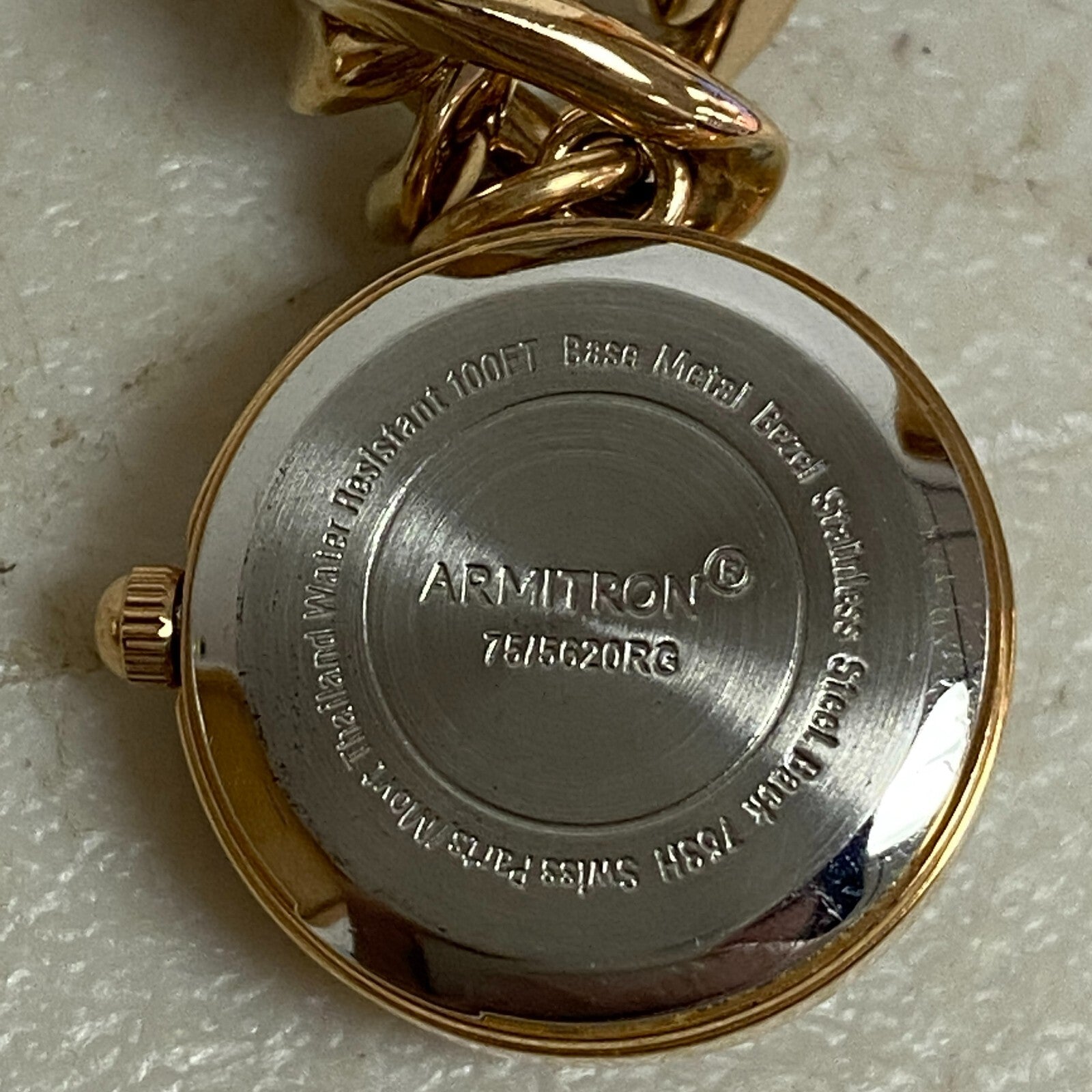 Armitron Women link bracelet with charm watch with key and lock charms 75/5067RG