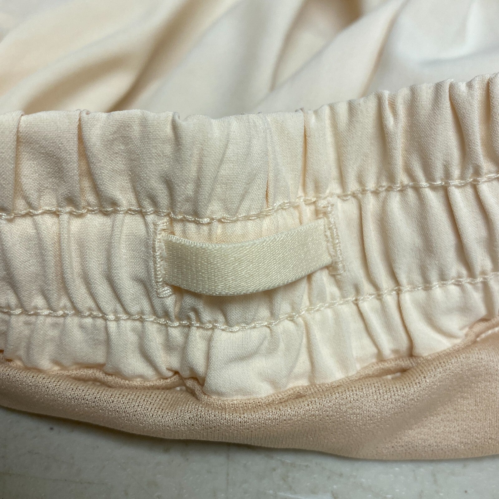 Calia Women 3" Run Mid Rise Infinity Run Short Relaxed Fit Washed Peach WAX12336