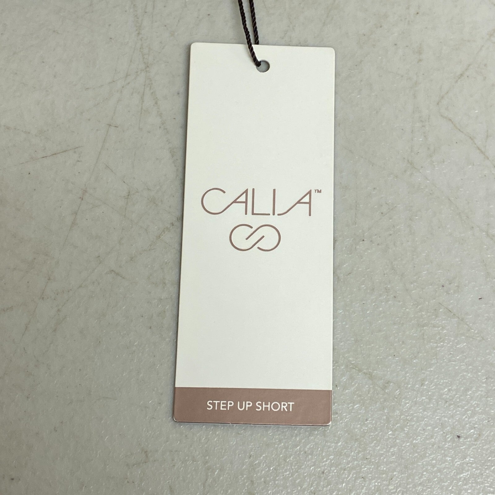 CALIA Performance Step Up Woven High Rise Petal Hem Short Pure Black WAX12259PRT