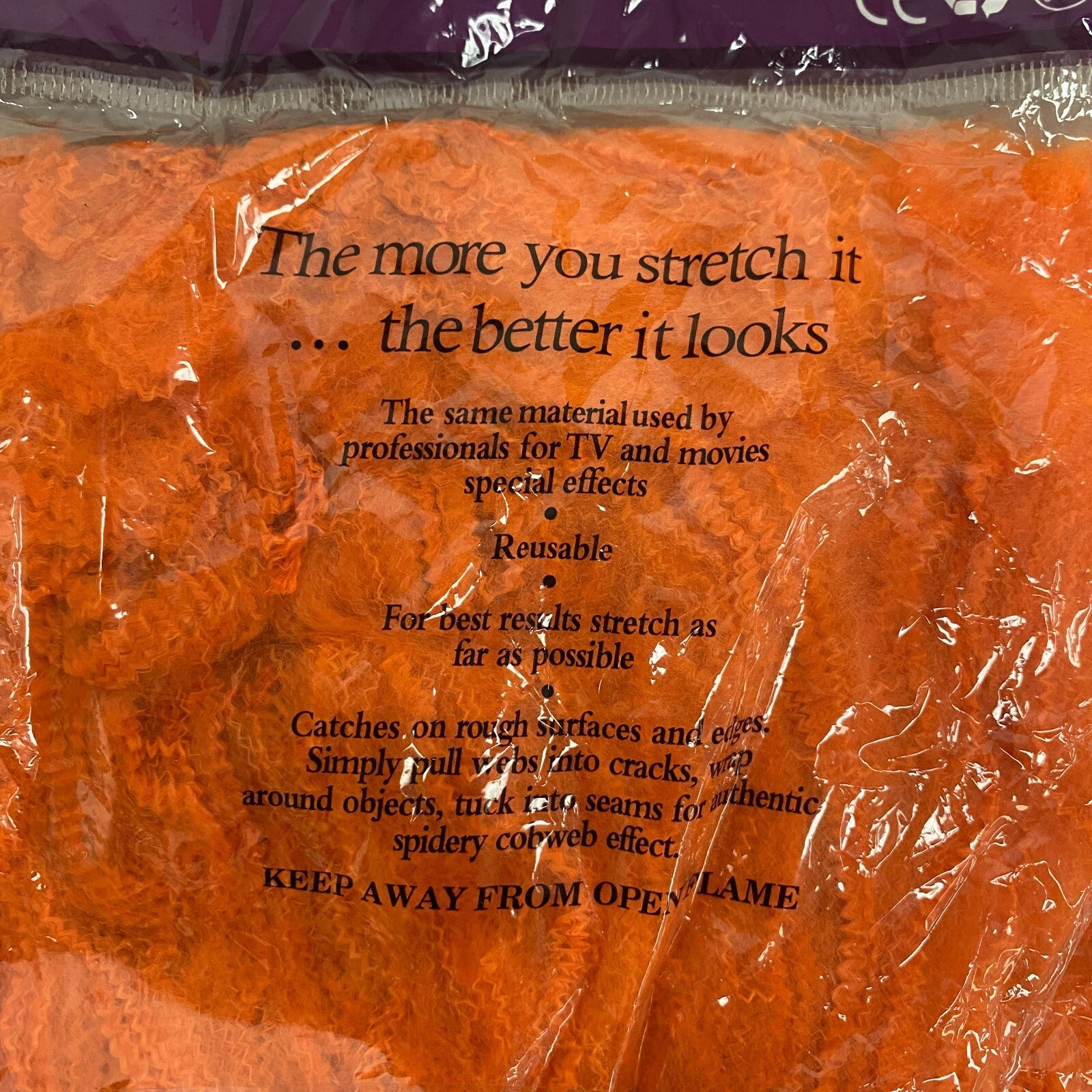 Stretchable Spider Web Decoration Orange w/ black spider Accents