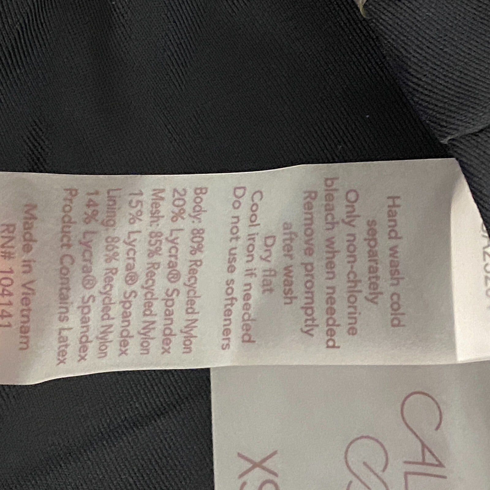 Calia Women's Swim Runched Front Cross Racerback Bikini Top Pure Black WSA23204