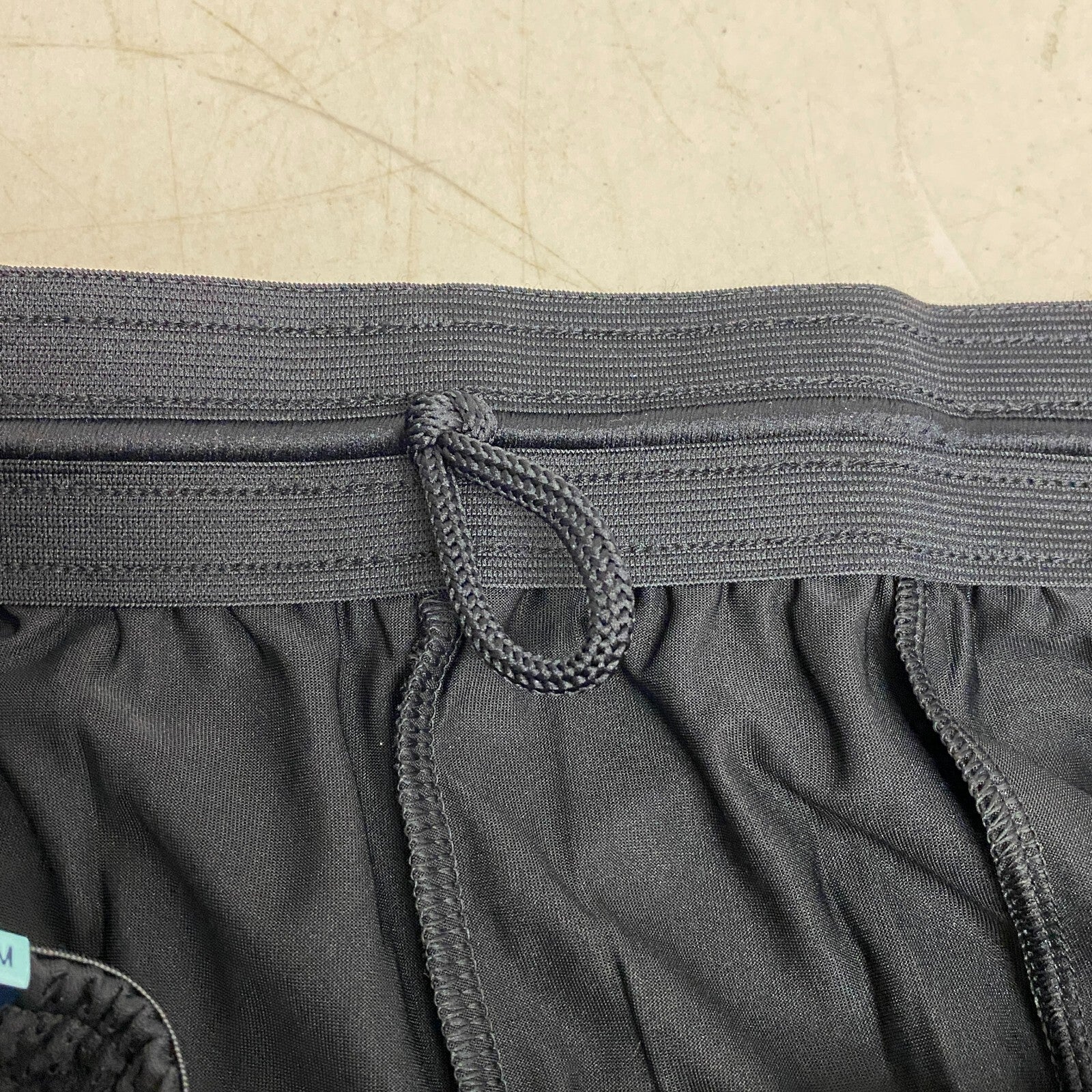 DSG Women's 7â RISE Mesh Shorts with Pockets Pure Black Relaxed Fit DAW39137M