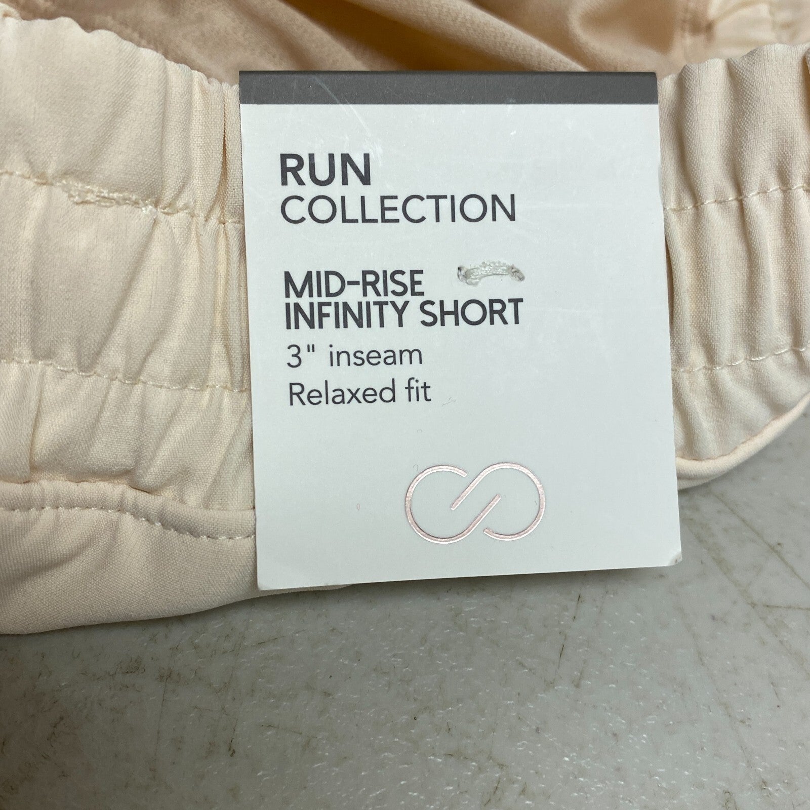 Calia Women 3" Run Mid Rise Infinity Run Short Relaxed Fit Washed Peach WAX12336