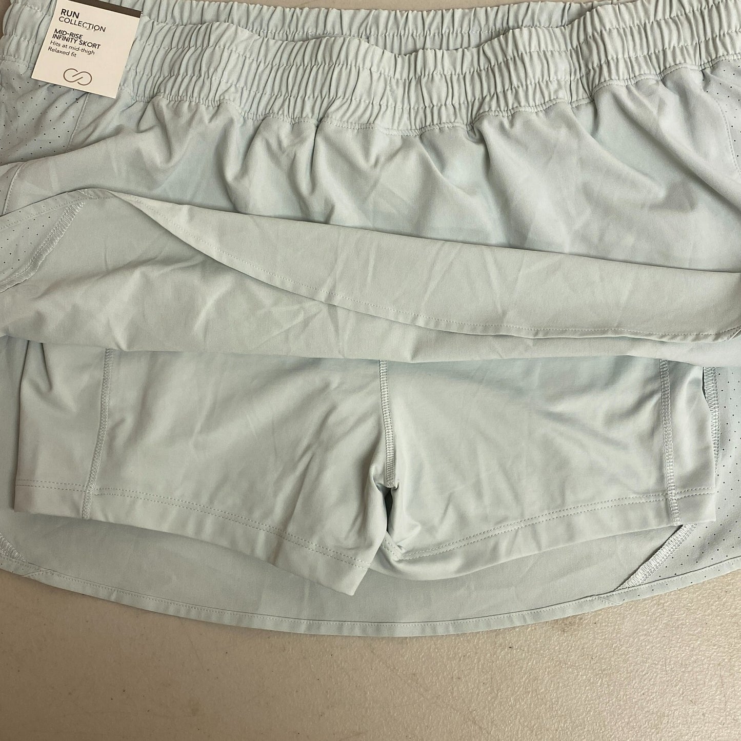 Calia Women's Mid Rise Infinity Run Skort Calming Green Relaxed Fit WAX12360