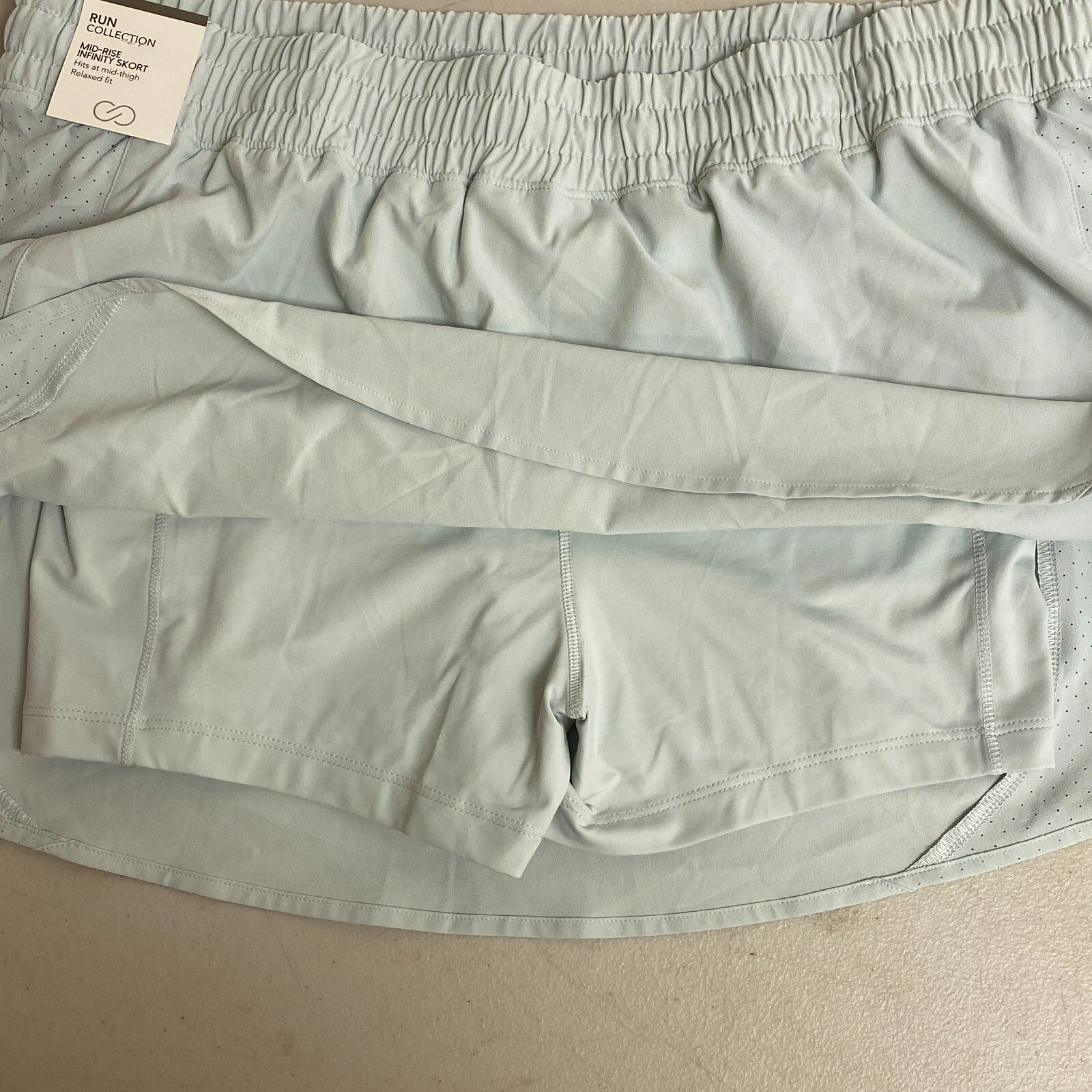 Calia Women's Mid Rise Infinity Run Skort Calming Green Relaxed Fit WAX12360