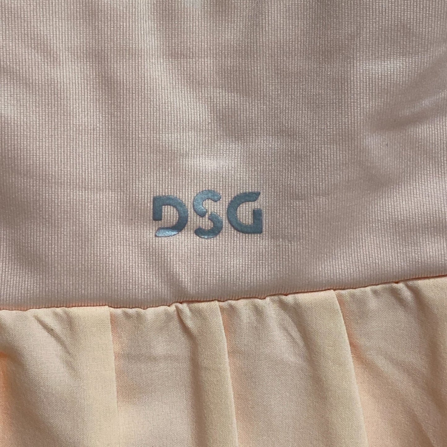 DSG Girls Performance Pleated Fashion Mid Rise Skort Cute Peach Milk DAG13110