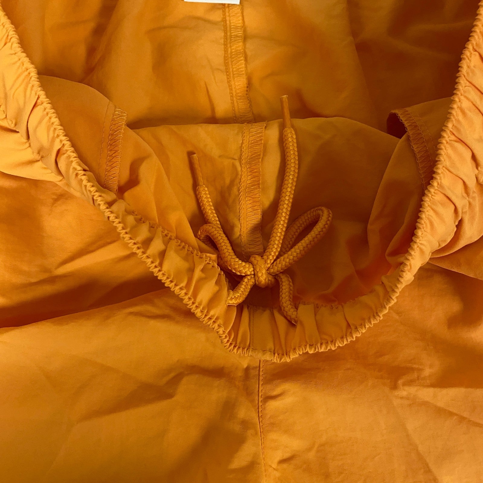 DSG Womenâs Notched Woven Shorts Light Orange Solid DAW13108