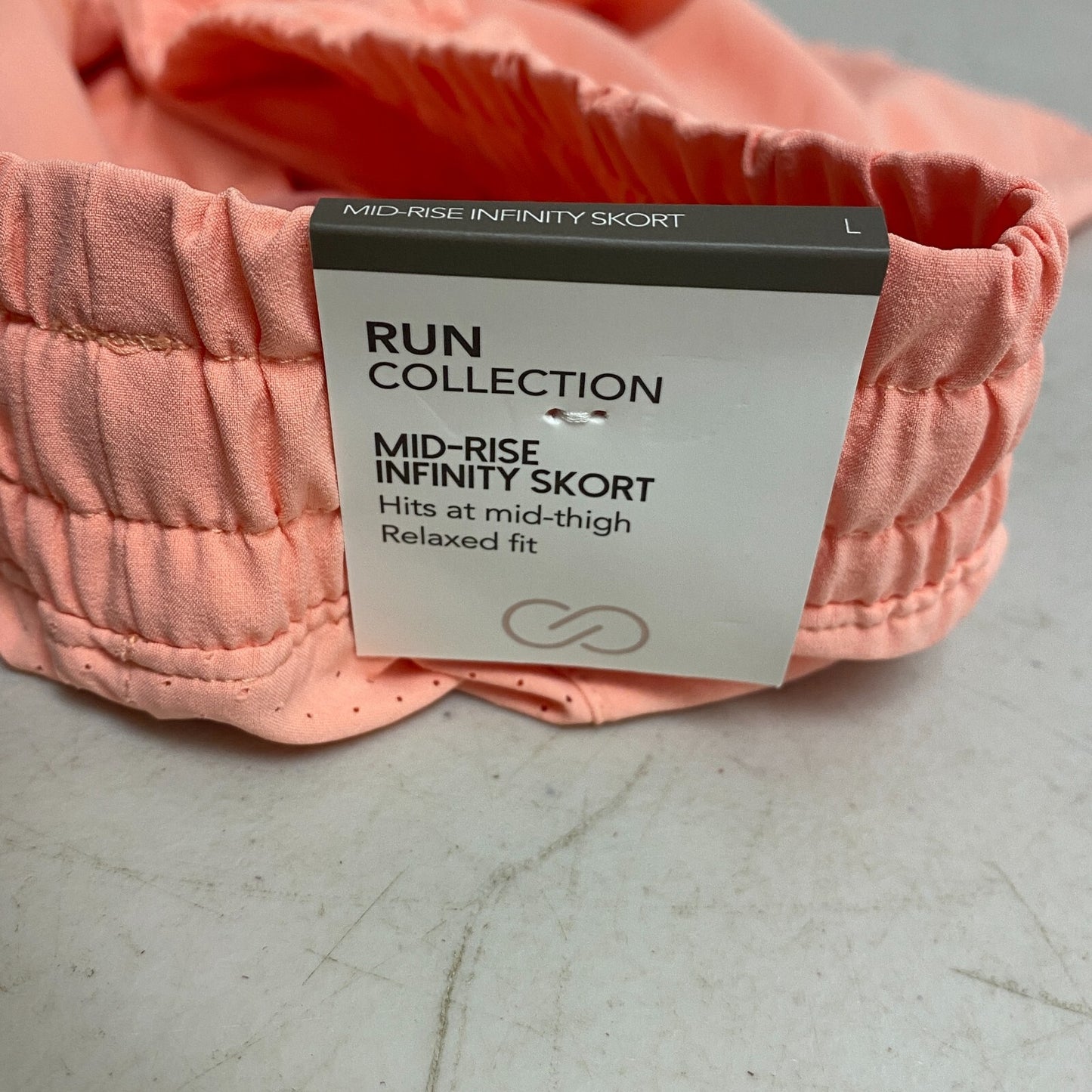 CALIA Women's Infinity Mid Rise Run Skort Relaxed Fit  Peach Glow WAX12360