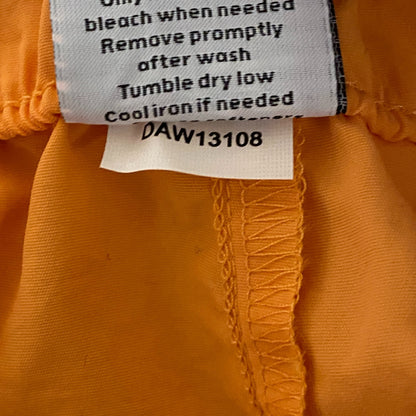 DSG Womenâs Notched Woven Shorts Light Orange Solid DAW13108