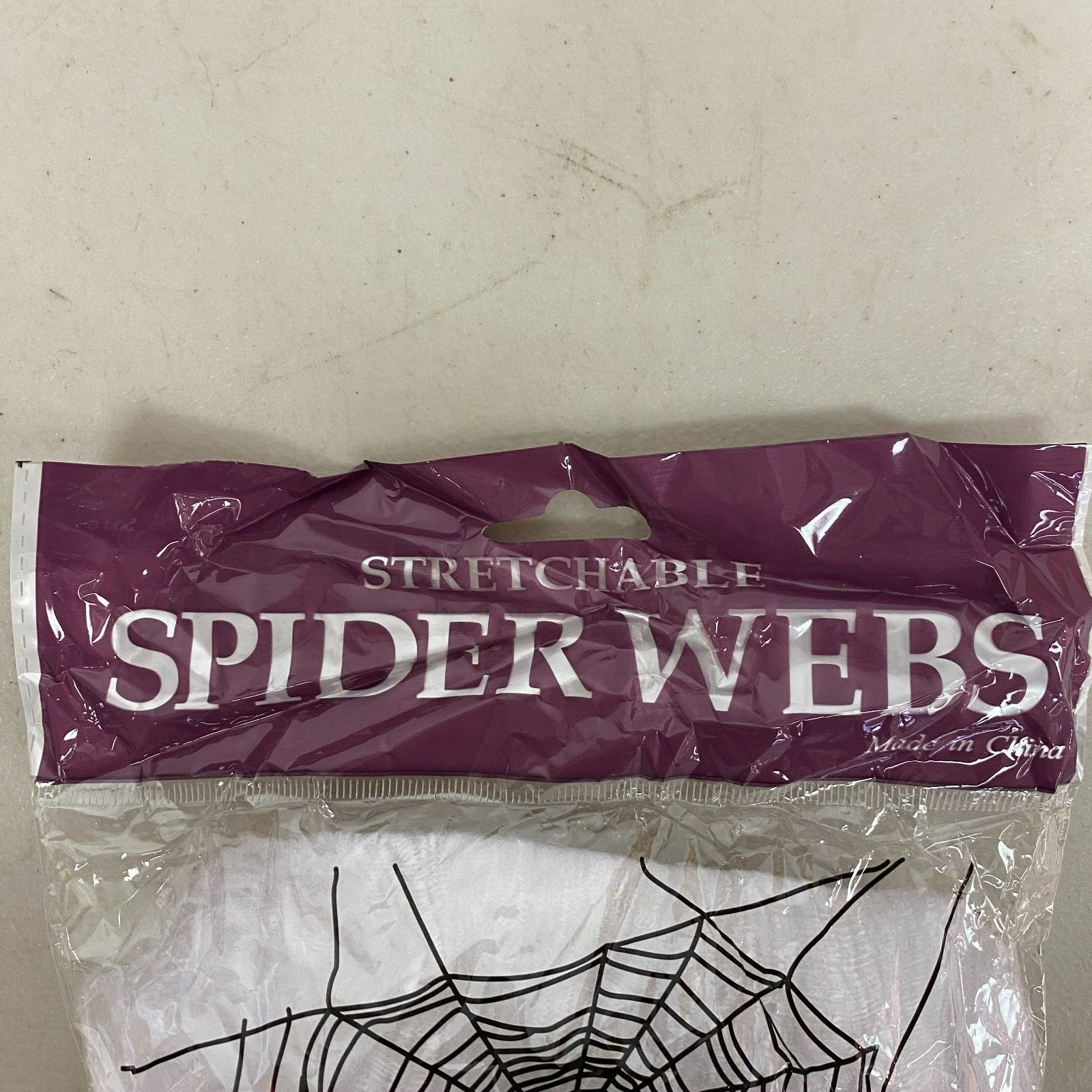 Stretchable Spider Web Decoration White w/ Black spider Accents