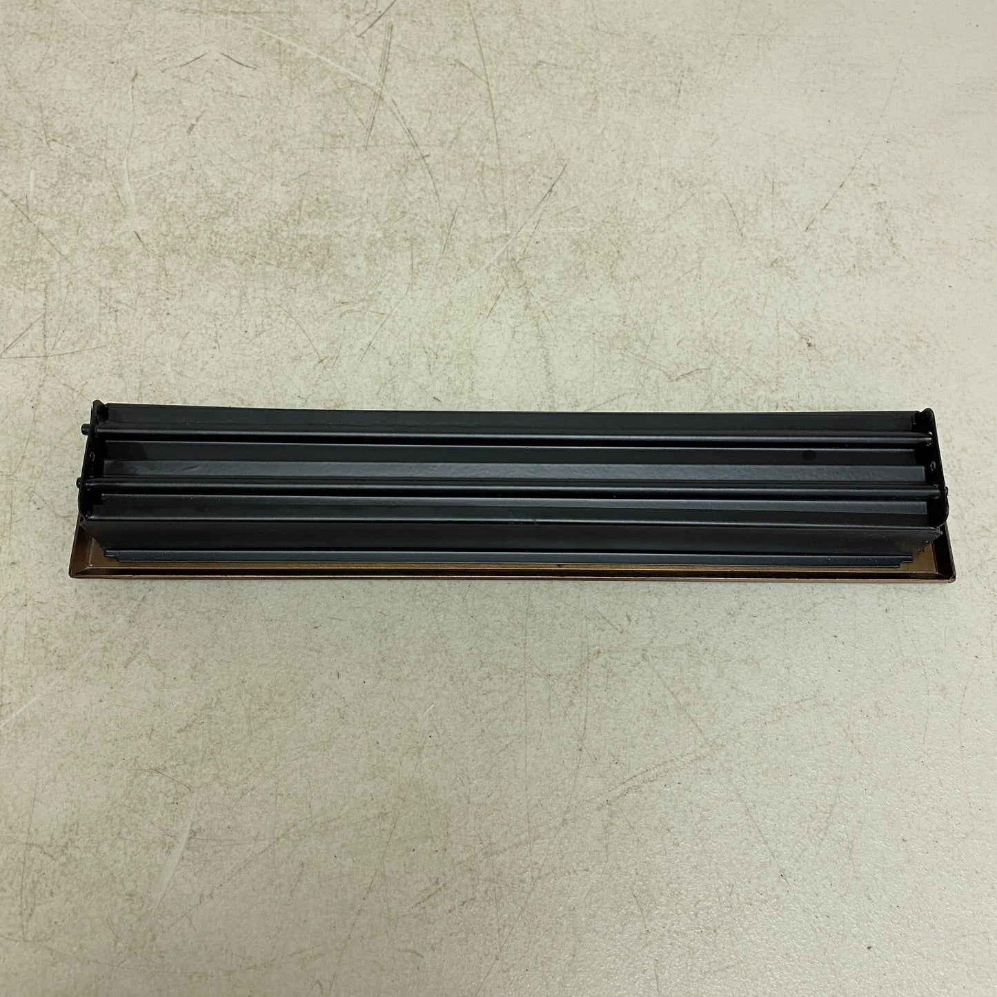 SIGNATURE HARDWARE OLD VICTORIAN STEEL FLOOR REGISTER WITH WALL CLIPS 2-1/4"....