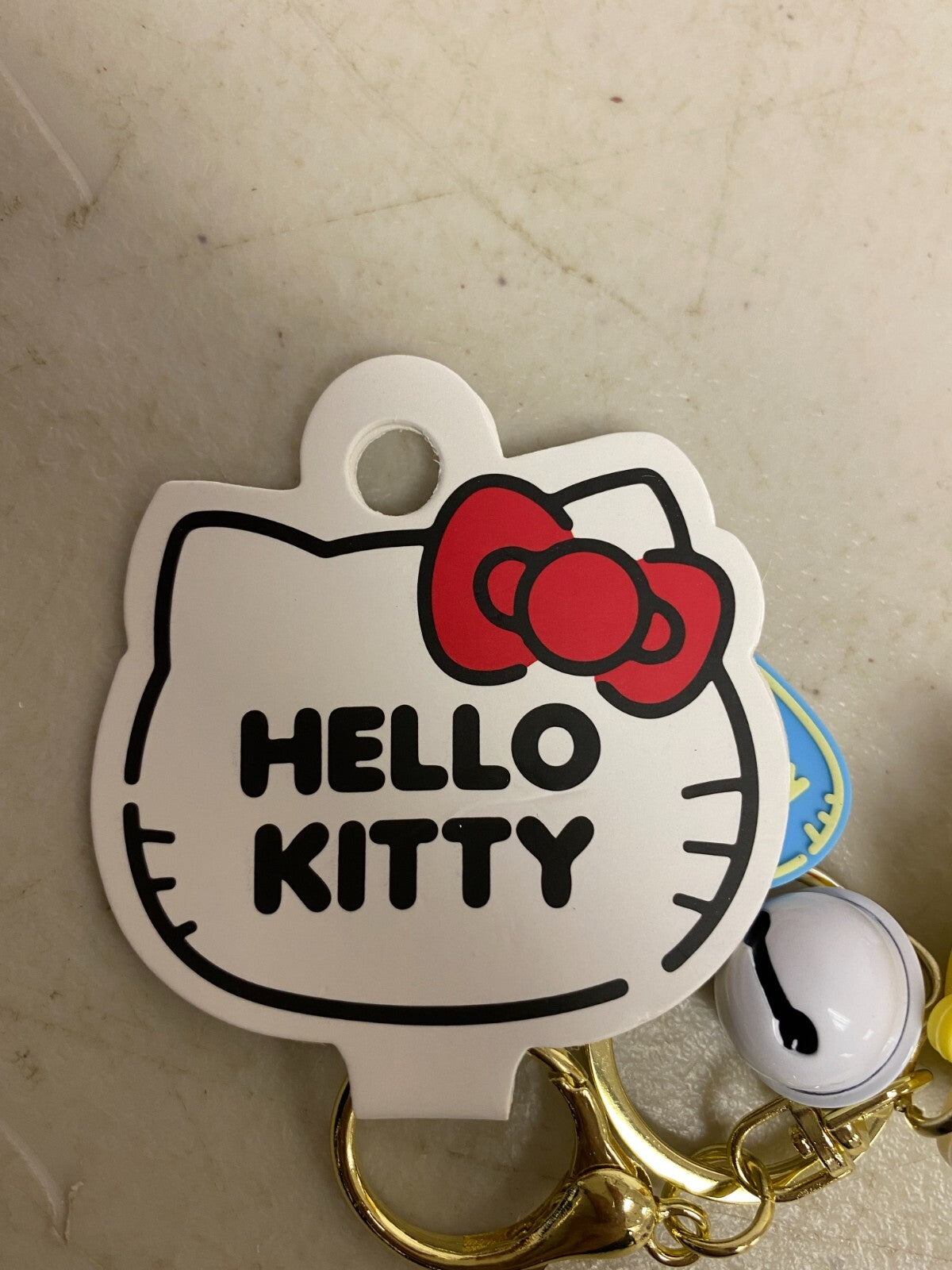 New Assorted Silicone Hello Kitty Keychain with Blue outfit and bell accessory