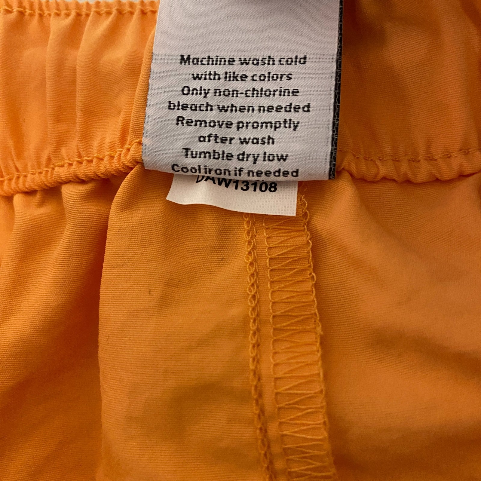 DSG Womenâs Notched Woven Shorts Light Orange Solid DAW13108