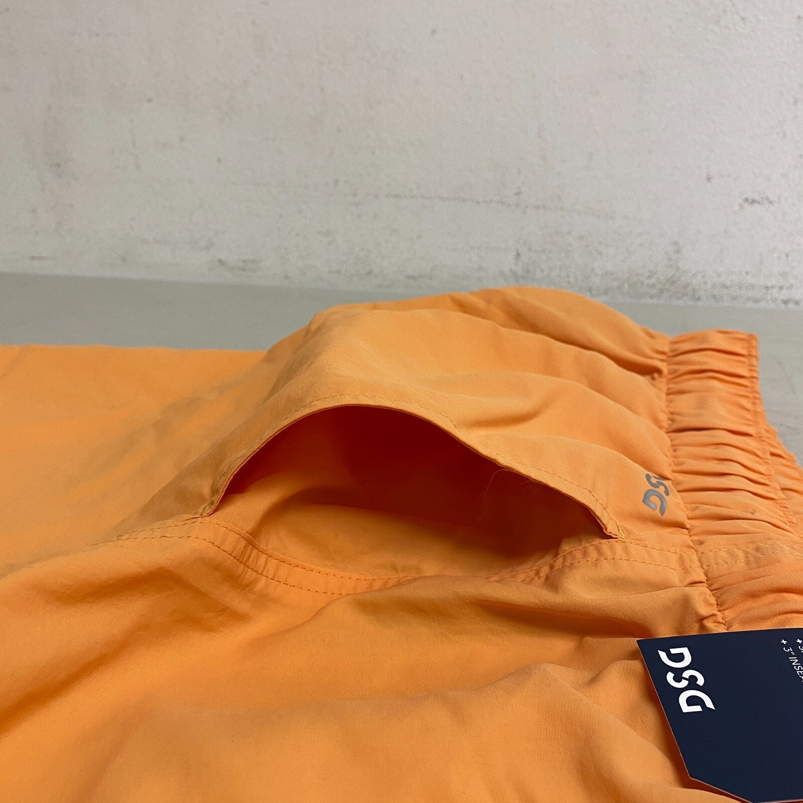 DSG Women's Notched Woven Shorts Light Orange DAW13108  BRAND NEW Solid