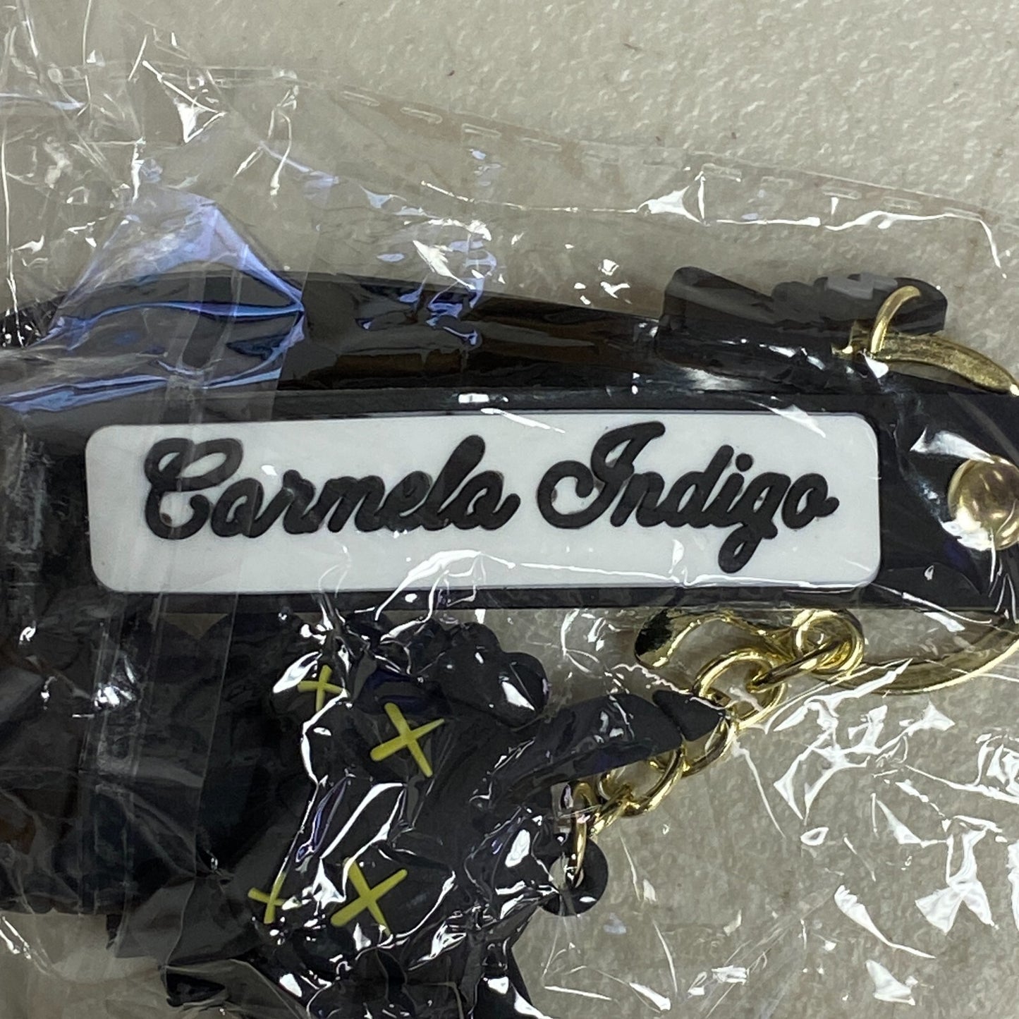 Assorted Carmela Indigo Silicone Keychain with Black kaws doll accessory