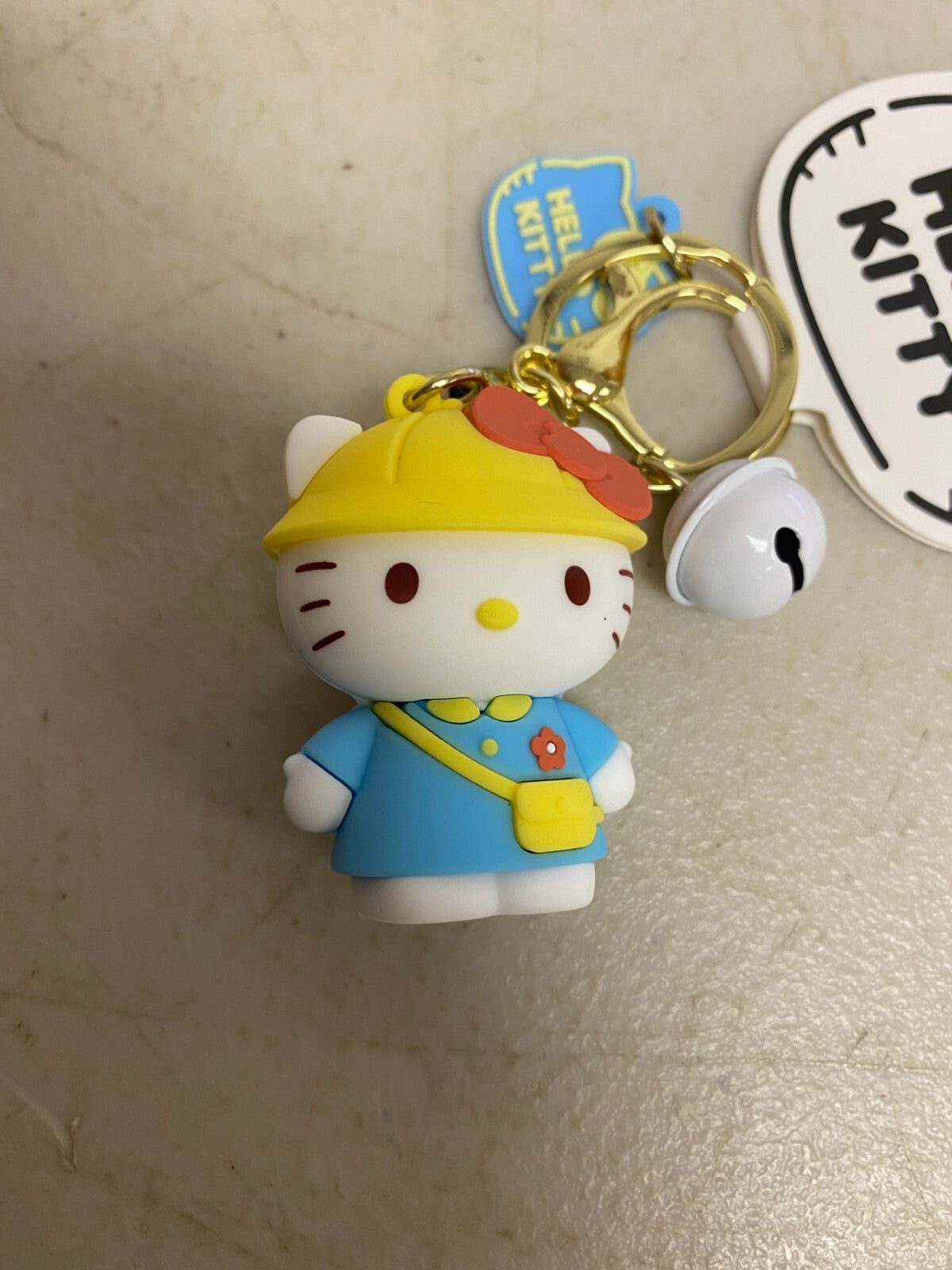 New Assorted Silicone Hello Kitty Keychain with Blue outfit and bell accessory