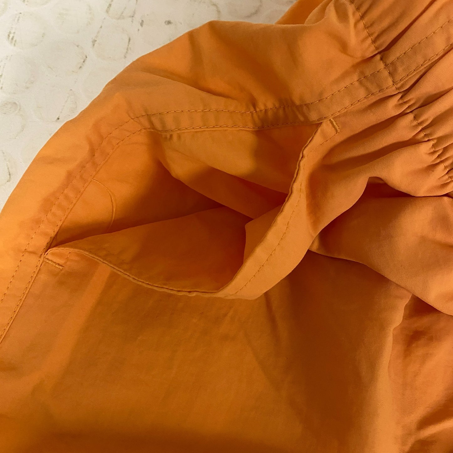 DSG Womenâs Notched Woven Shorts Light Orange Solid DAW13108