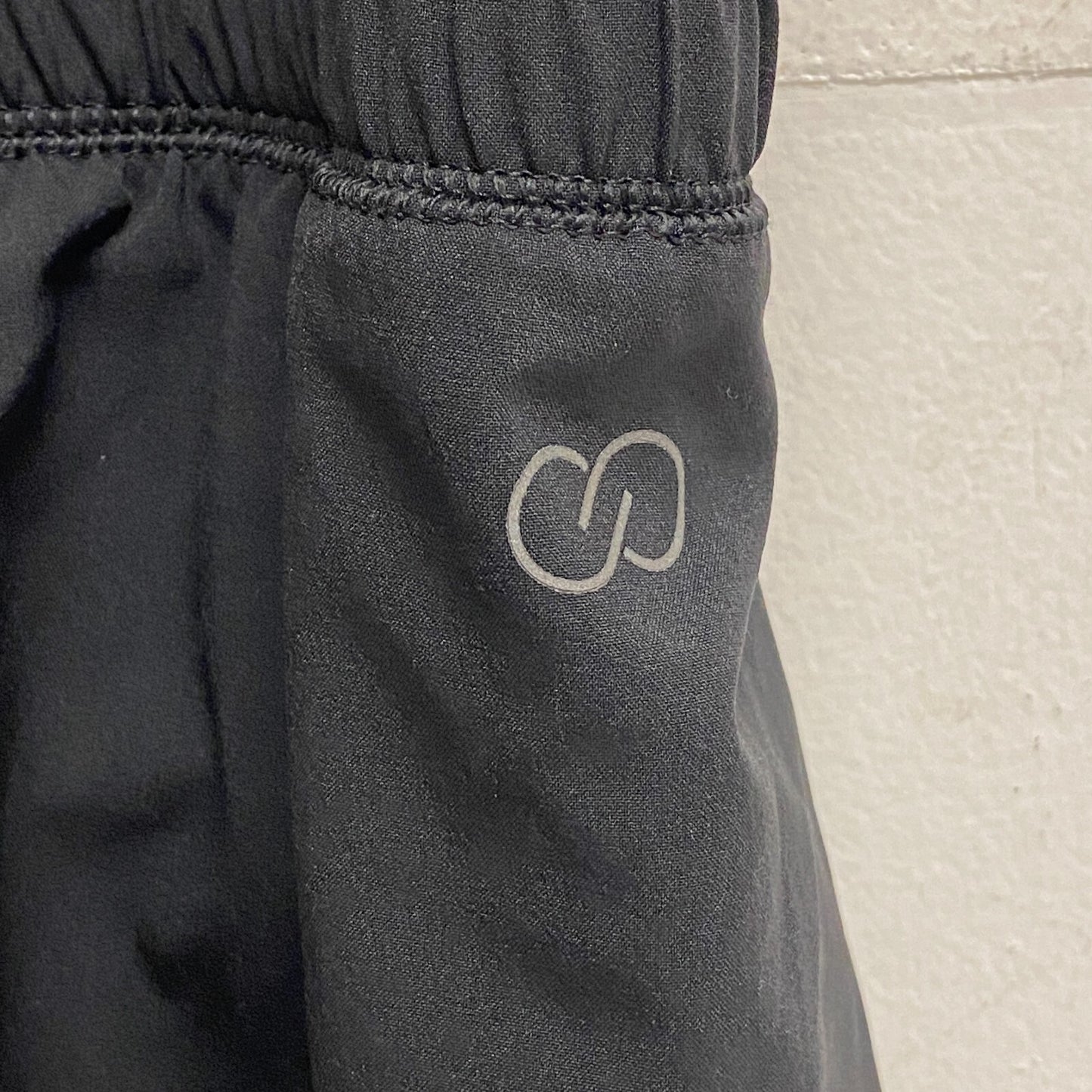 CALIA Performance Step Up Woven High Rise Petal Hem Short Pure Black WAX12259PRT