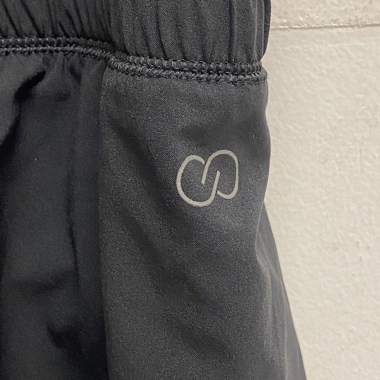 CALIA Performance Step Up Woven High Rise Petal Hem Short Pure Black WAX12259PRT