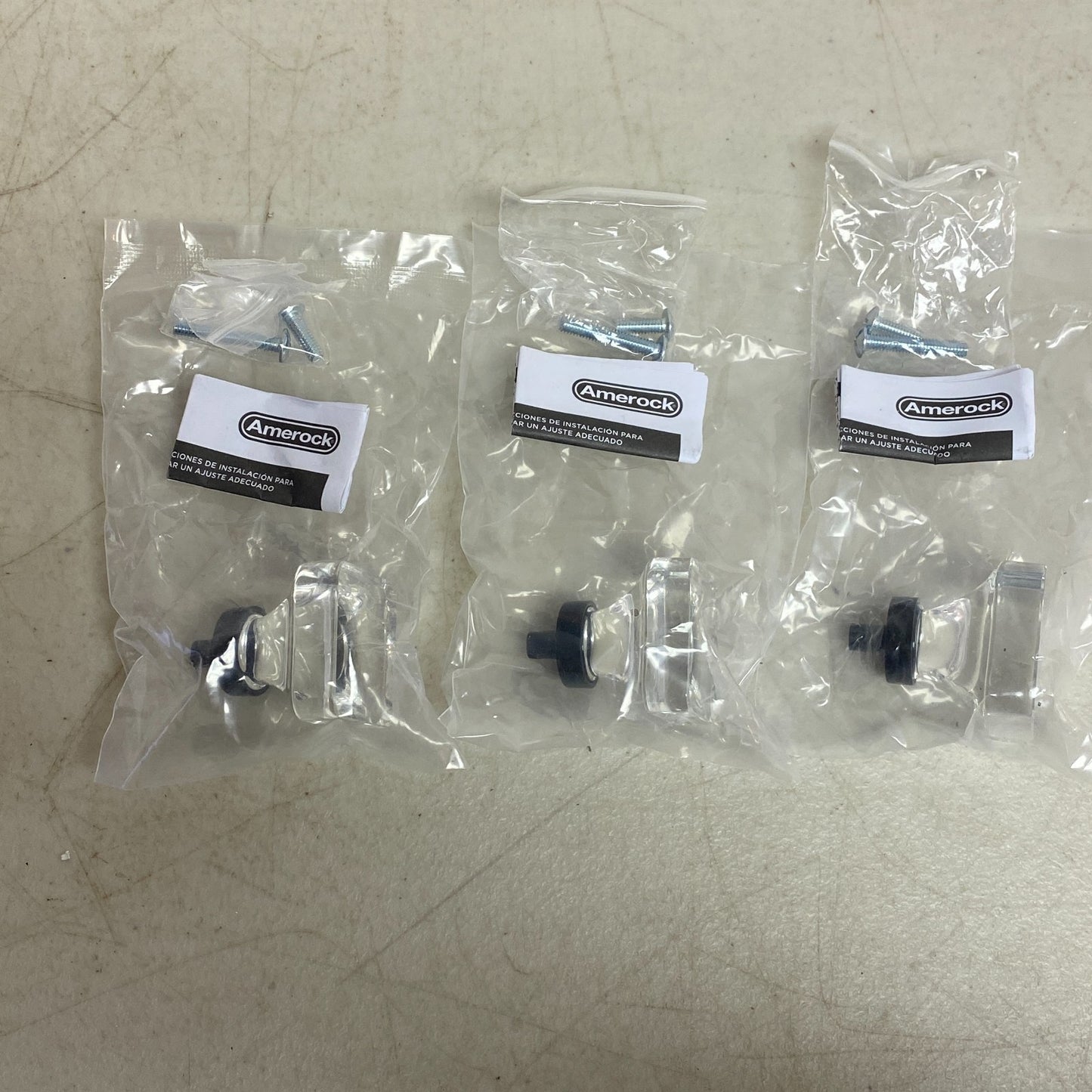 Amerock Glacio Collection 3 pack 1-3/8 in (35mm) Knob Clear/Black Bronze