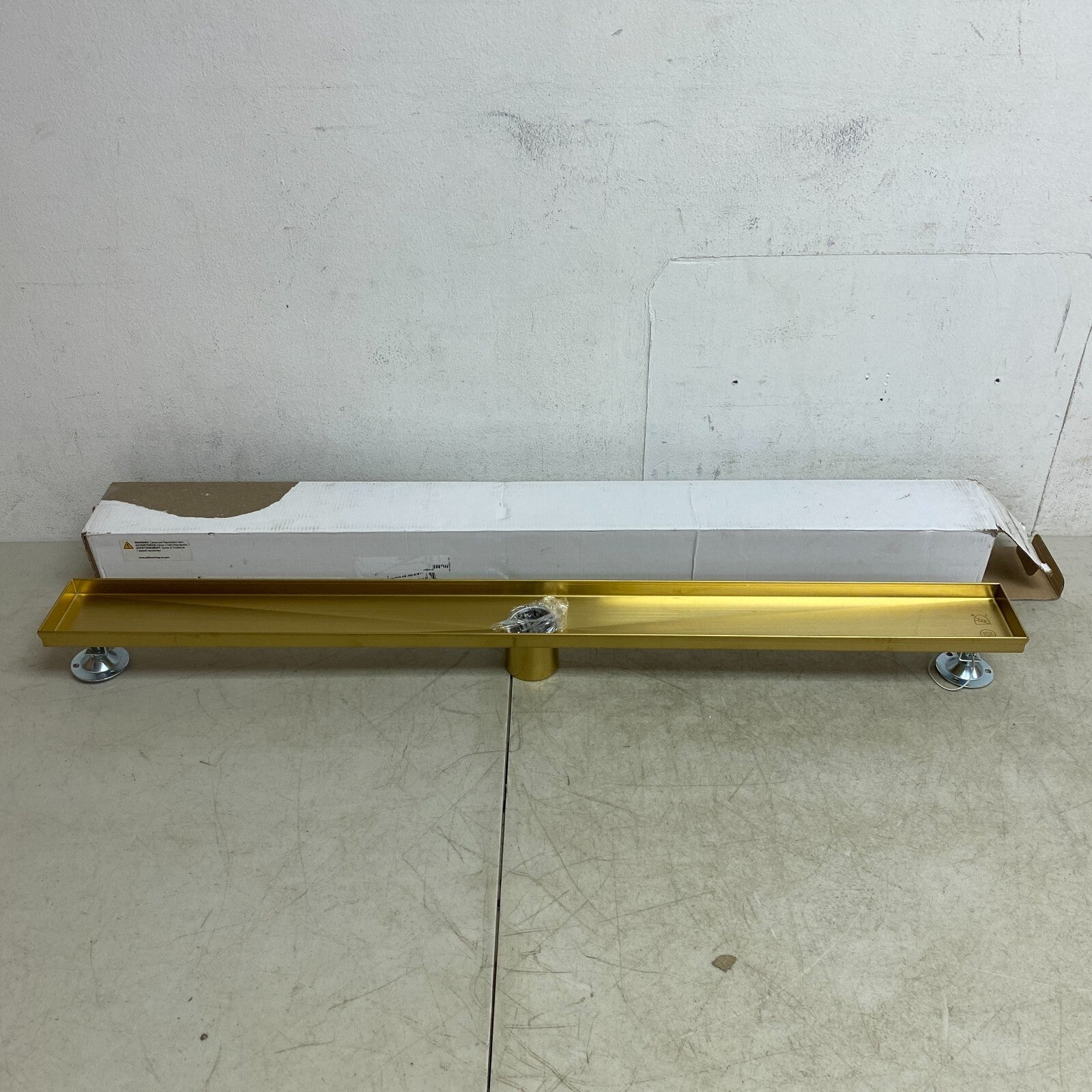 SIGNATURE HARDWARE 36" COHEN LINEAR TILE IN SOWER DRAIN-POLISHED BRASS