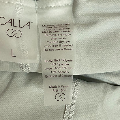 Calia Women's Mid Rise Infinity Run Skort Calming Green Relaxed Fit WAX12360