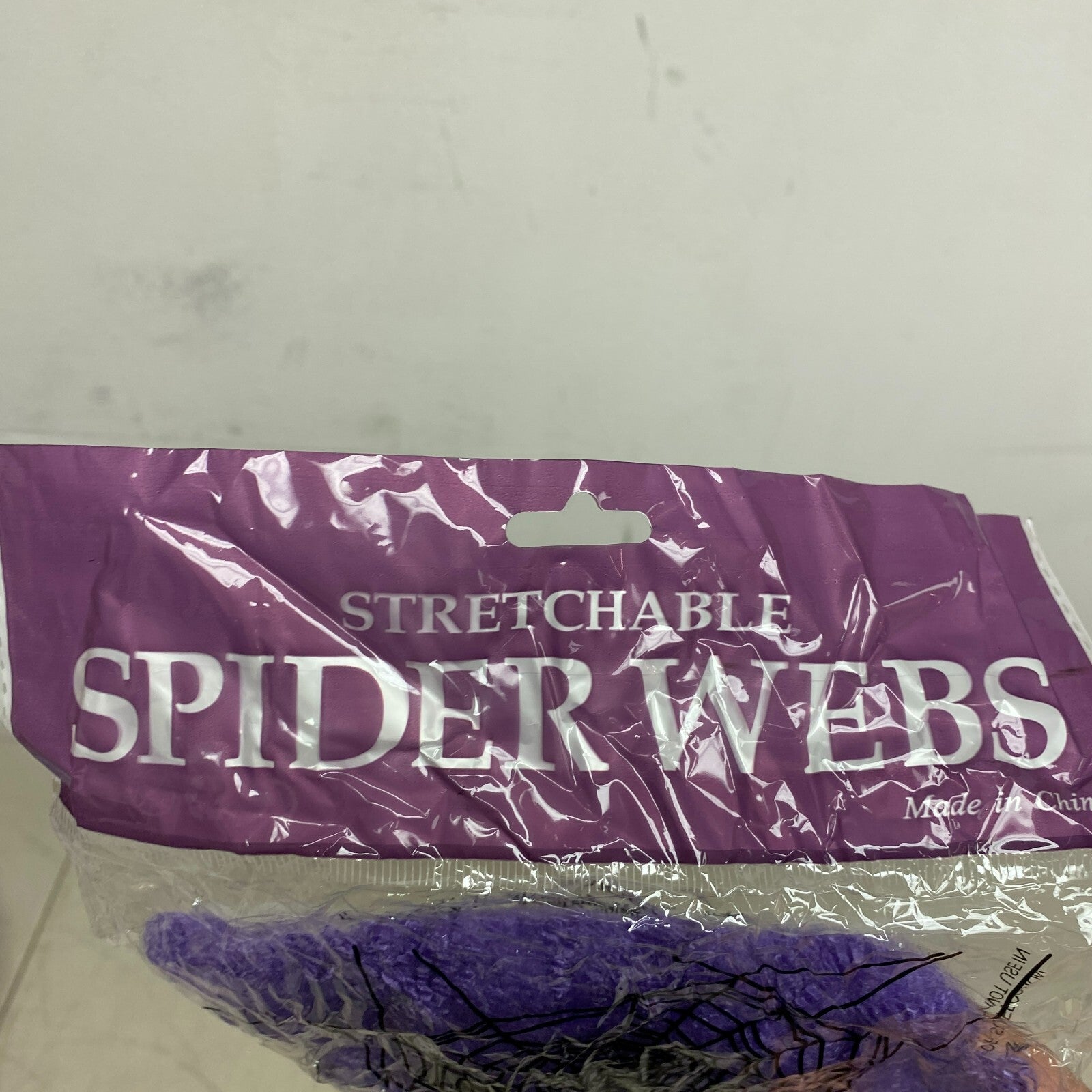 Stretchable Spider Web Decoration Purple w/ Black Spider Accents