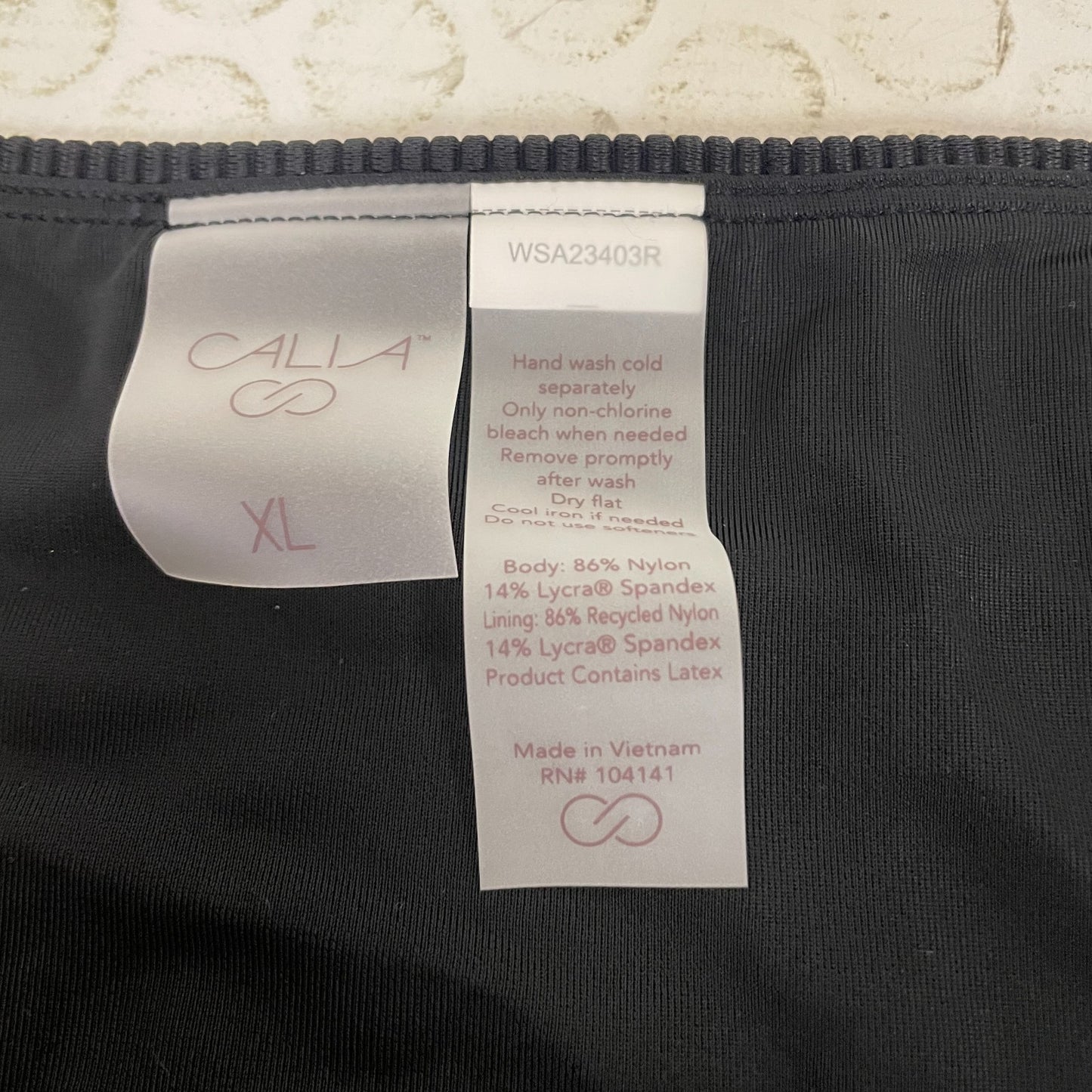 Calia Womenâs Novelty Mid Rise Swim Bottom Pure Black Bikini WSA22411N