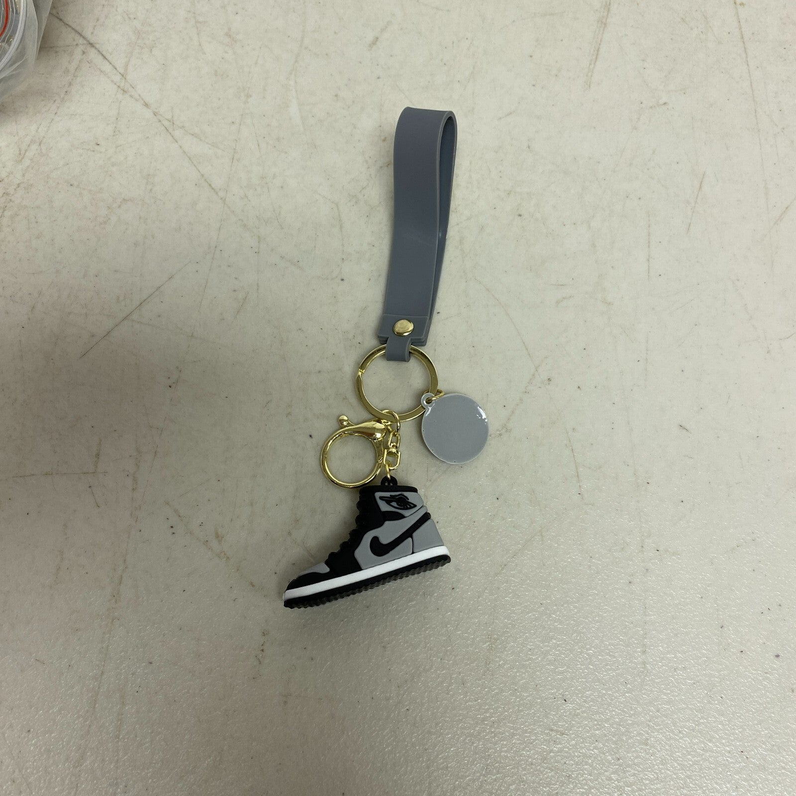 Assorted Silicone Air Jordan 1 Grey and Black Keychain Accessory