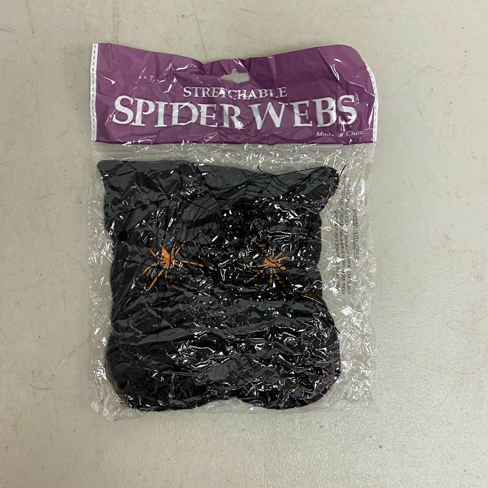 Stretchable Spider Web Decoration Black w/ Orange Spider Accents