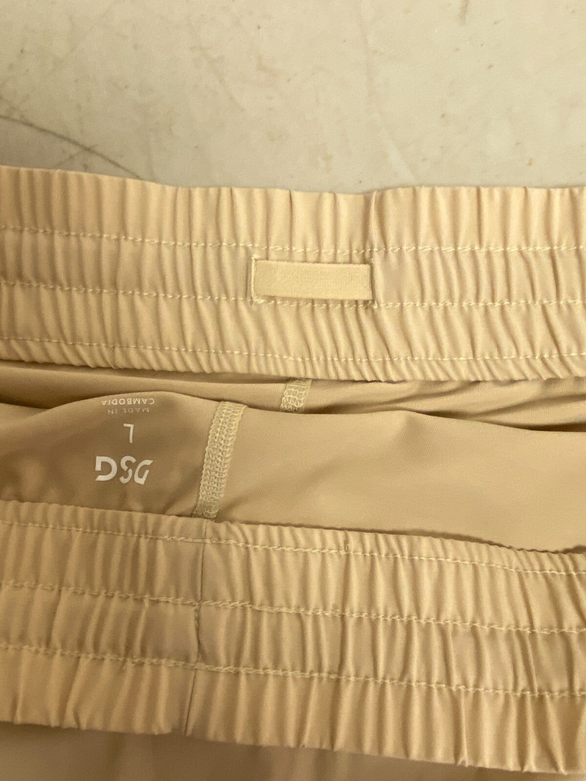 DSG Women's Stride Skort Creme/tan PocketLess Polyester Spandex Size Womens Larg